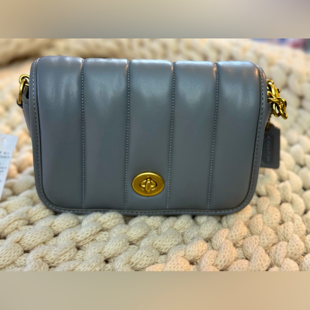 NWT. Coach Quilted Dinky 18